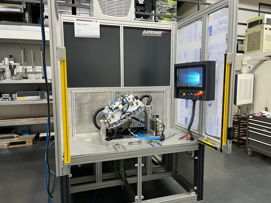 SELECT diode laser welding station with part fixture and operator terminal